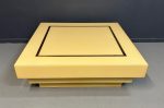 1970s Acrylic Stepped Cream Colored Coffee Table with Brass Ribbon Inlay Online now