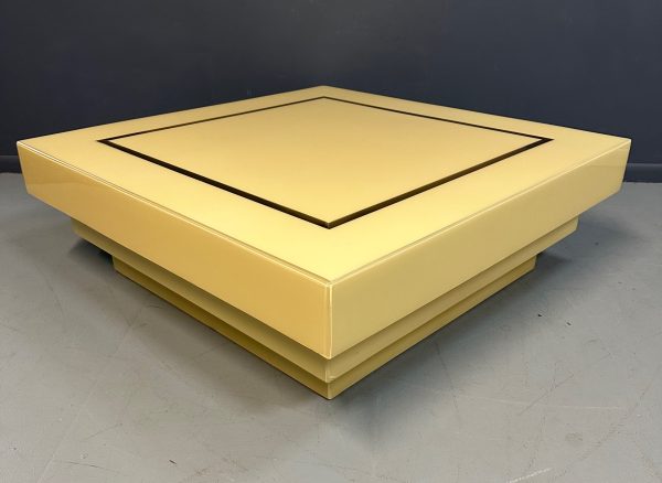 1970s Acrylic Stepped Cream Colored Coffee Table with Brass Ribbon Inlay Online now