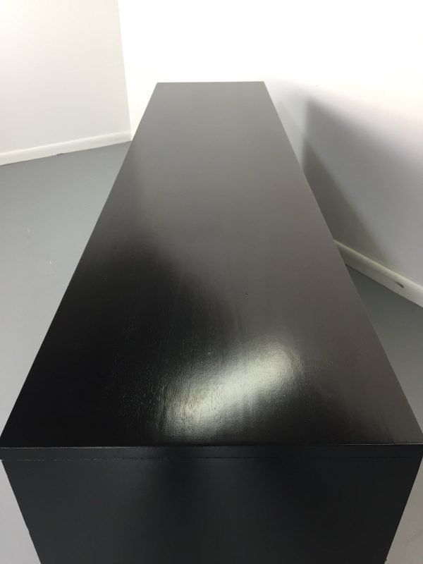 Sculptural Ebonized Credenza with Silver Leafed Front For Sale